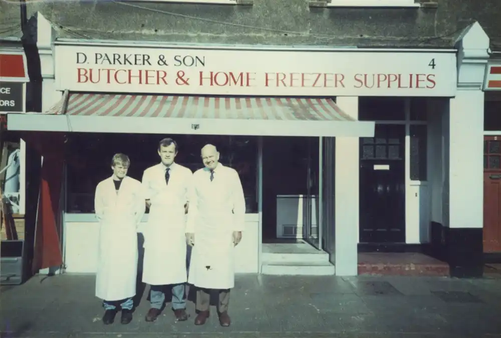 3 generations outside the shop.